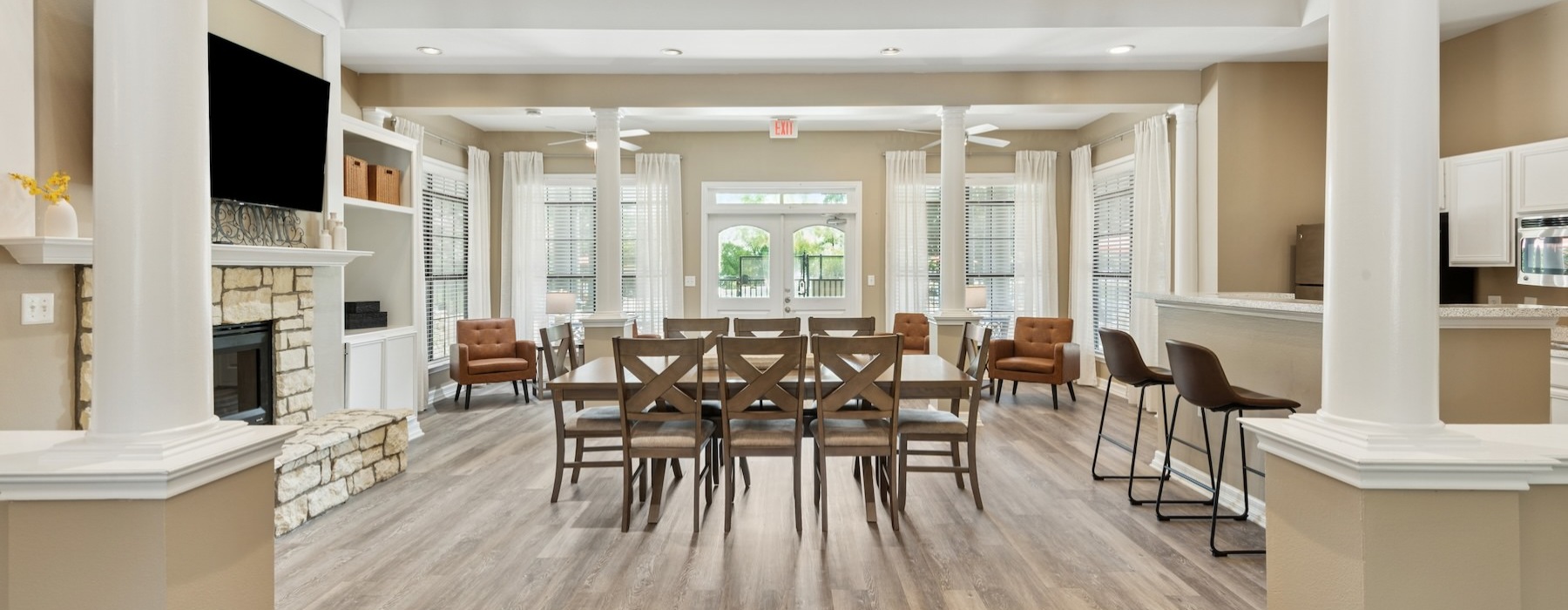 a large room with a table and chairs