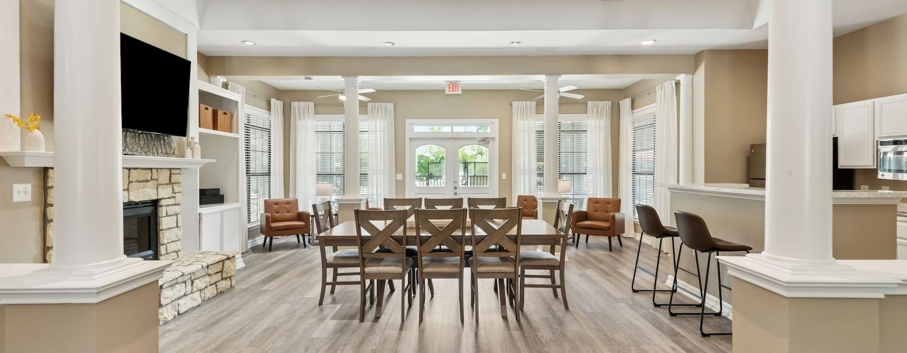 a large room with a table and chairs