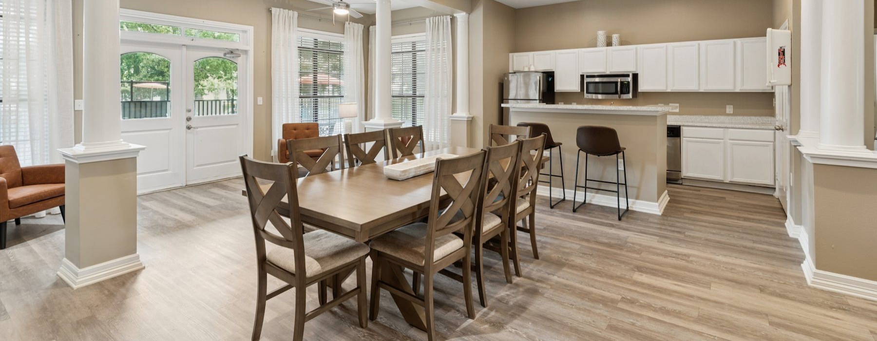 a community kitchen with a dining table